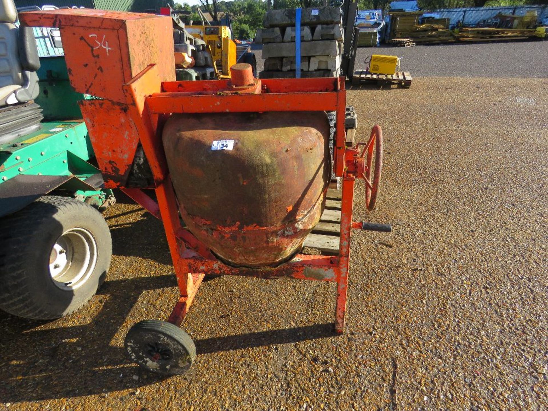 SMALL SIZED PETROL ENGINED CEMENT MIXER.