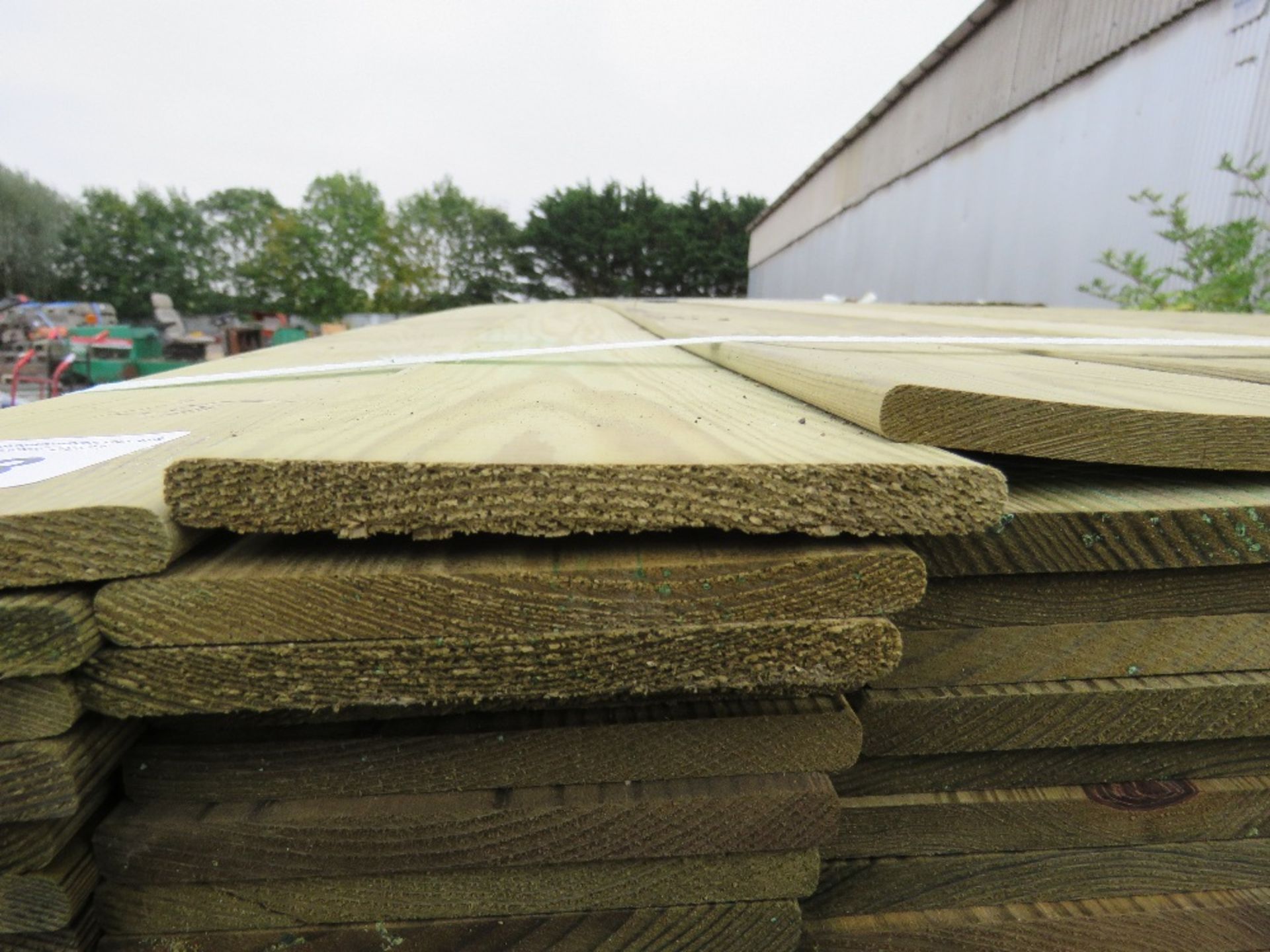 LARGE PACK OF TREATED HIT AND MISS THIN TIMBER CLADDING BOARDS, 1.75M LENGTH X 9.5CM WIDTH APPROX. - Image 3 of 4