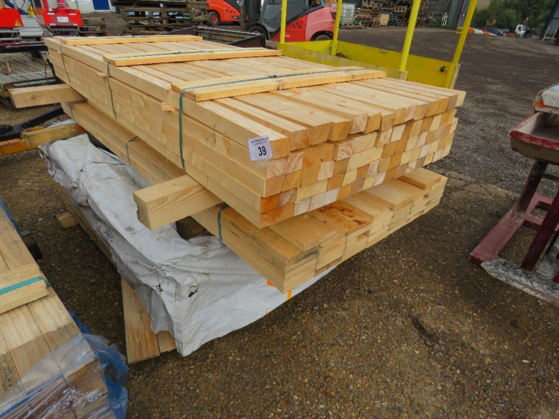 STACK OF ASSORTED FENCING TIMBERS.