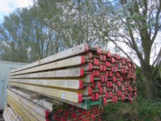 BUNDLE OF I BEAM WOODEN SHUTTERING BEAMS, 50NO APPROX IN THE BUNDLE, 4.9METRE LENGTH. ALSO SUITABLE