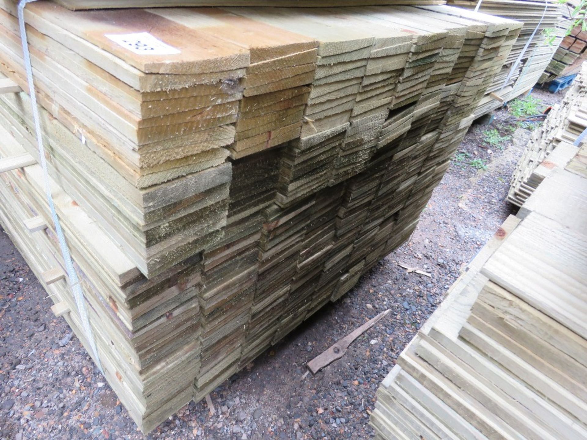 LARGE PACK OF TREATED FEATHER EDGE TIMBER CLADDING BOARDS, 1.65M LENGTH X 10CM WIDTH APPROX. - Image 2 of 3