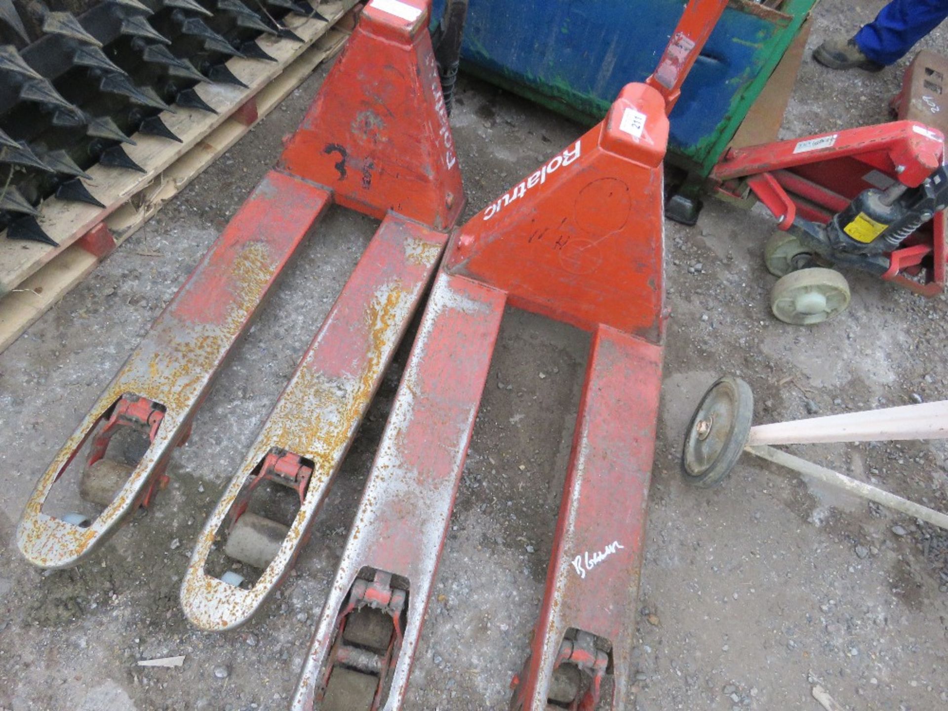 2 X PALLET TRUCKS. WHEN TESTED WERE SEEN TO LIFT AND LOWER. THIS LOT IS SOLD UNDER THE AUCTIONEERS M