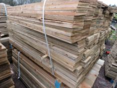 LARGE PACK OF TREATED FEATHER EDGE TIMBER CLADDING BOARDS, 1.65M LENGTH X 10CM WIDTH APPROX.