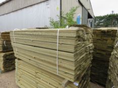 LARGE PACK OF TREATED HIT AND MISS THIN TIMBER CLADDING BOARDS, 1.75M LENGTH X 9.5CM WIDTH APPROX.