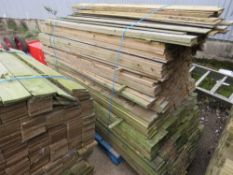 LARGE PACK OF TREATED FEATHER EDGE TIMBER CLADDING BOARDS, 1.79M LENGTH X 10CM WIDTH APPROX.