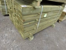LARGE PACK OF PRESSURE TREATED FEATHER EDGE TIMBER FENCE CLADDING BOARDS. SIZE: 1.49M LENGTH,