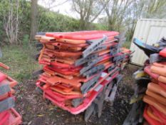 STACK OF APPROXIMATELY 30 X PLASTIC CHAPTER 8 BARRIERS.