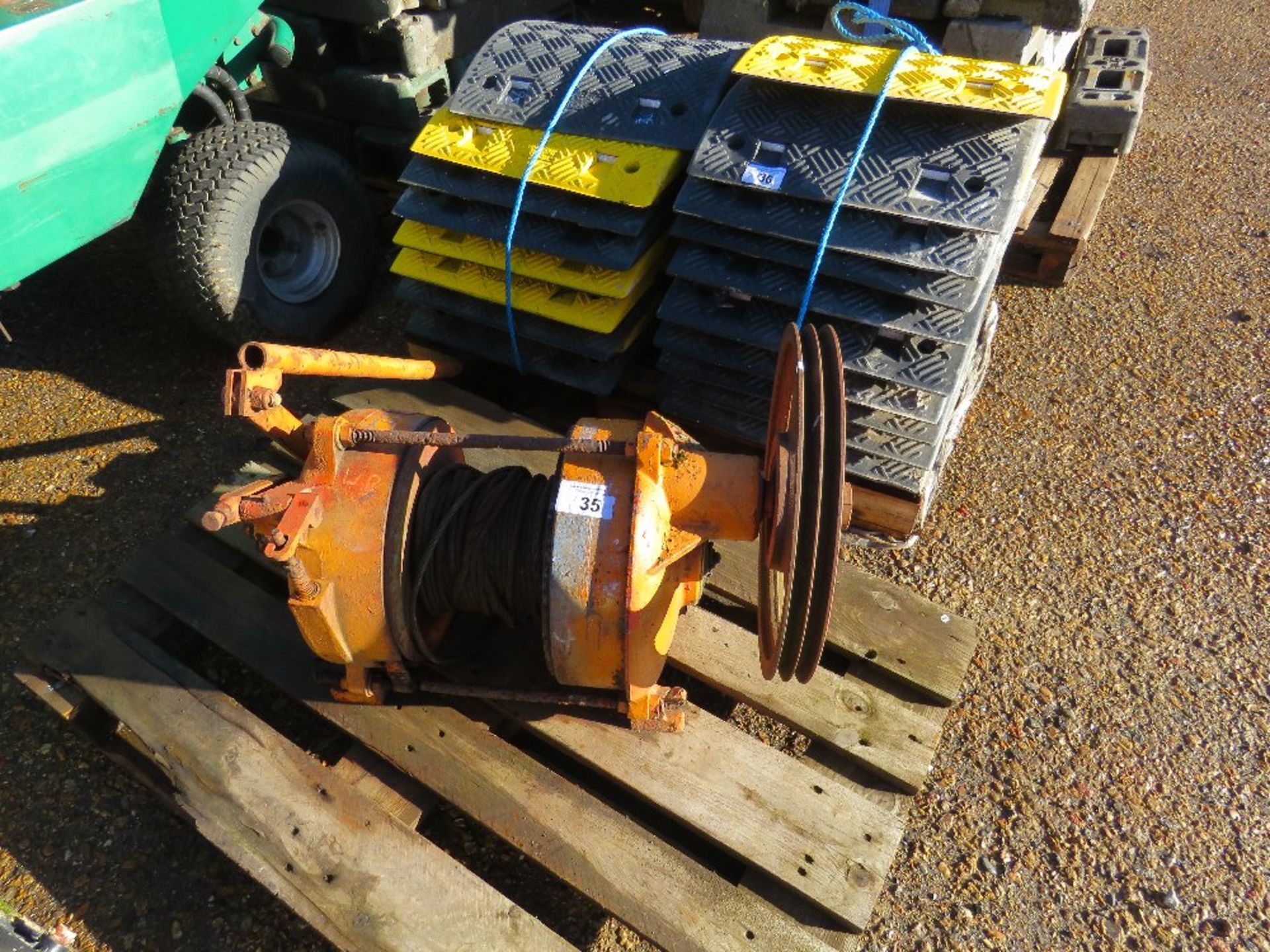 FLYWHEEL/BELT DRIVEN WINCH UNIT.