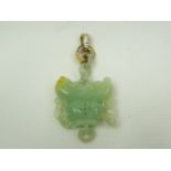 Jade pendant on 18ct gold and diamond bale