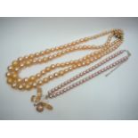 2 Faux Pearl Necklaces