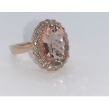 18ct rose gold morganite beryl and diamond ring. 6.2g. UK size L