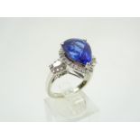 Platinum and 5.75ct tanzanite and diamond ring