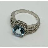 9ct white gold blue stone and diamond ring