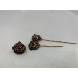 18ct stick pins with rubies, sapphires and diamonds. 5.98g