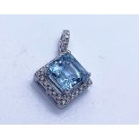 18ct white gold aquamarine and diamond pendant