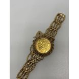 9ct gold gate bracelet and sovereign