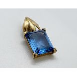 9ct gold blue topaz pendant