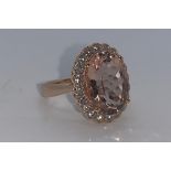 18ct rose gold, morganite beryl and diamond ring