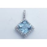 18ct white gold aquamarine and diamond pendant