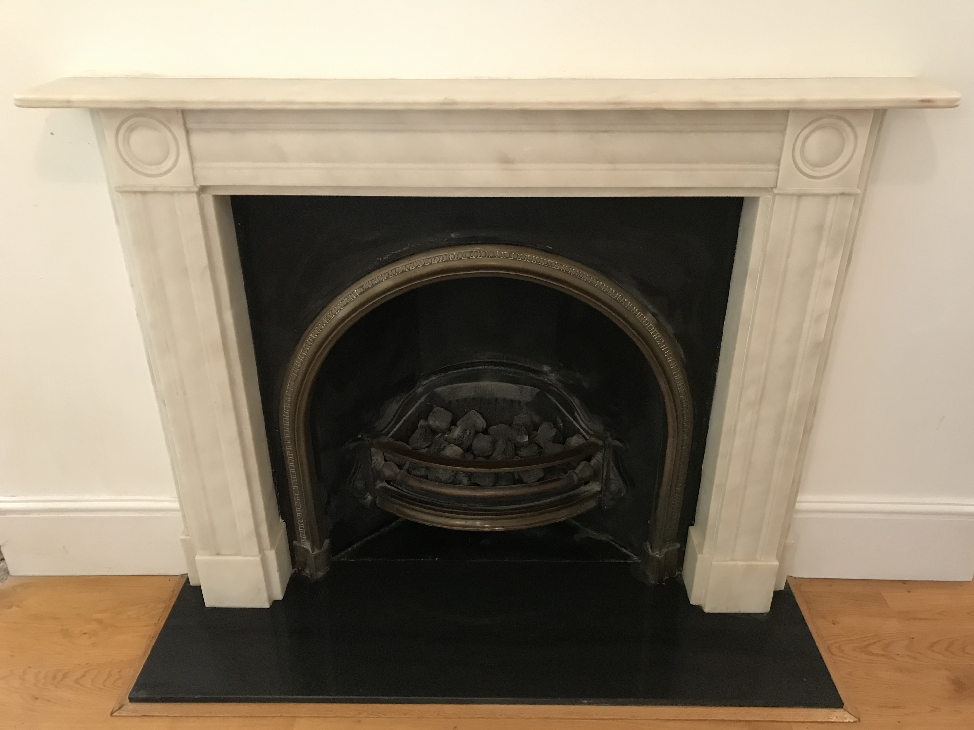 Fine white marble fireplace.