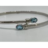 9ct white gold blue topaz bangle