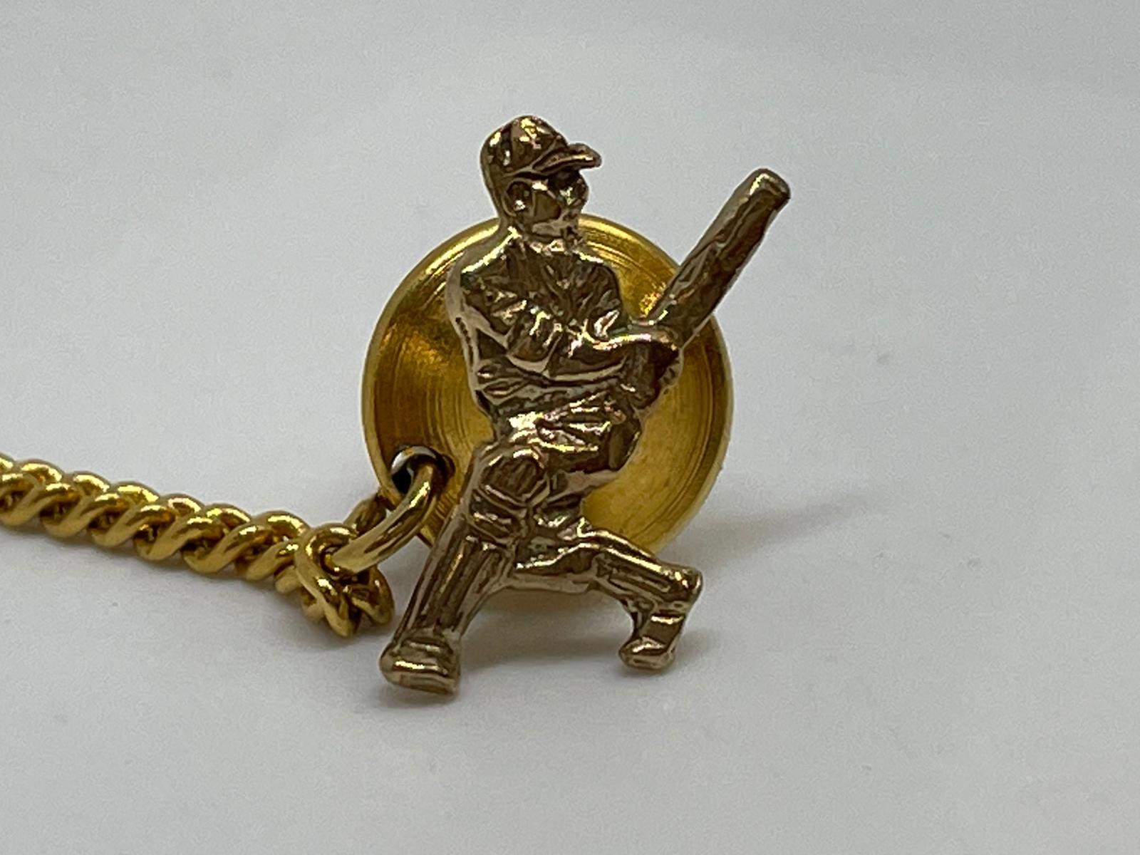 9ct cricketer brooch