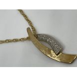 9ct gold and diamond pendant and chain