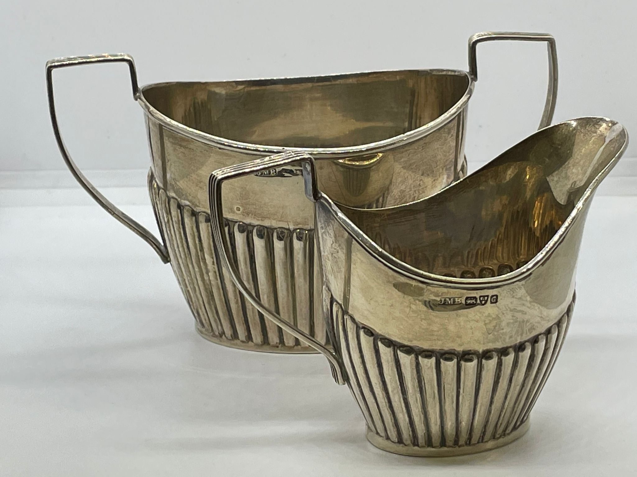 Silver milk jug and sugar basin