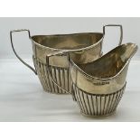 Silver milk jug and sugar basin