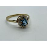 9ct gold blue topaz and diamond ring