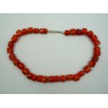 Heavy coral bead necklace
