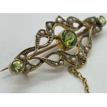 14/15ct gold seed pearl and peridot brooch