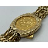 9ct gold 1/2 sovereign bracelet