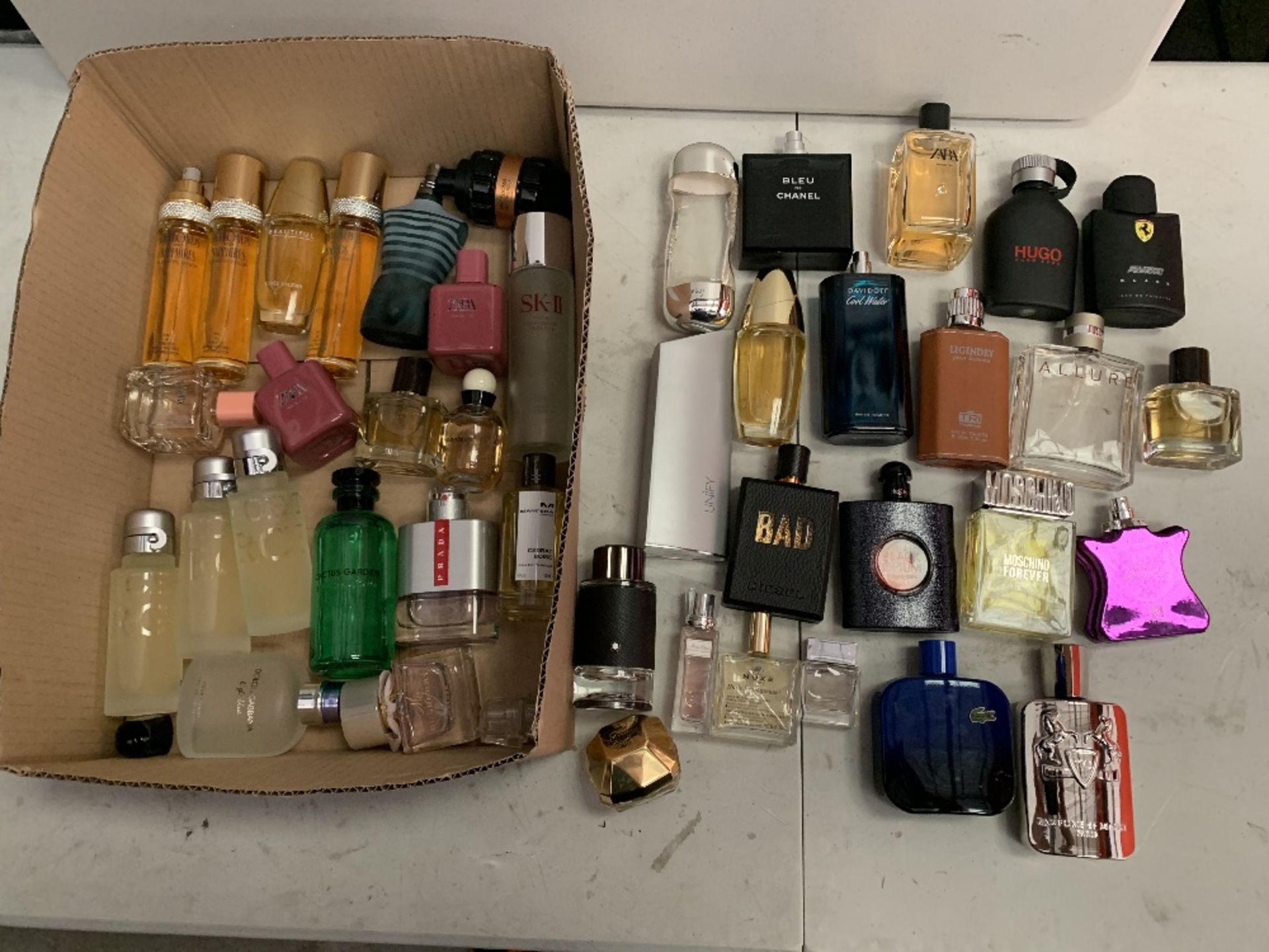 Perfume and fragrances part used forty units to include; Mont Blanc, Louis Vuitton, Chanel.