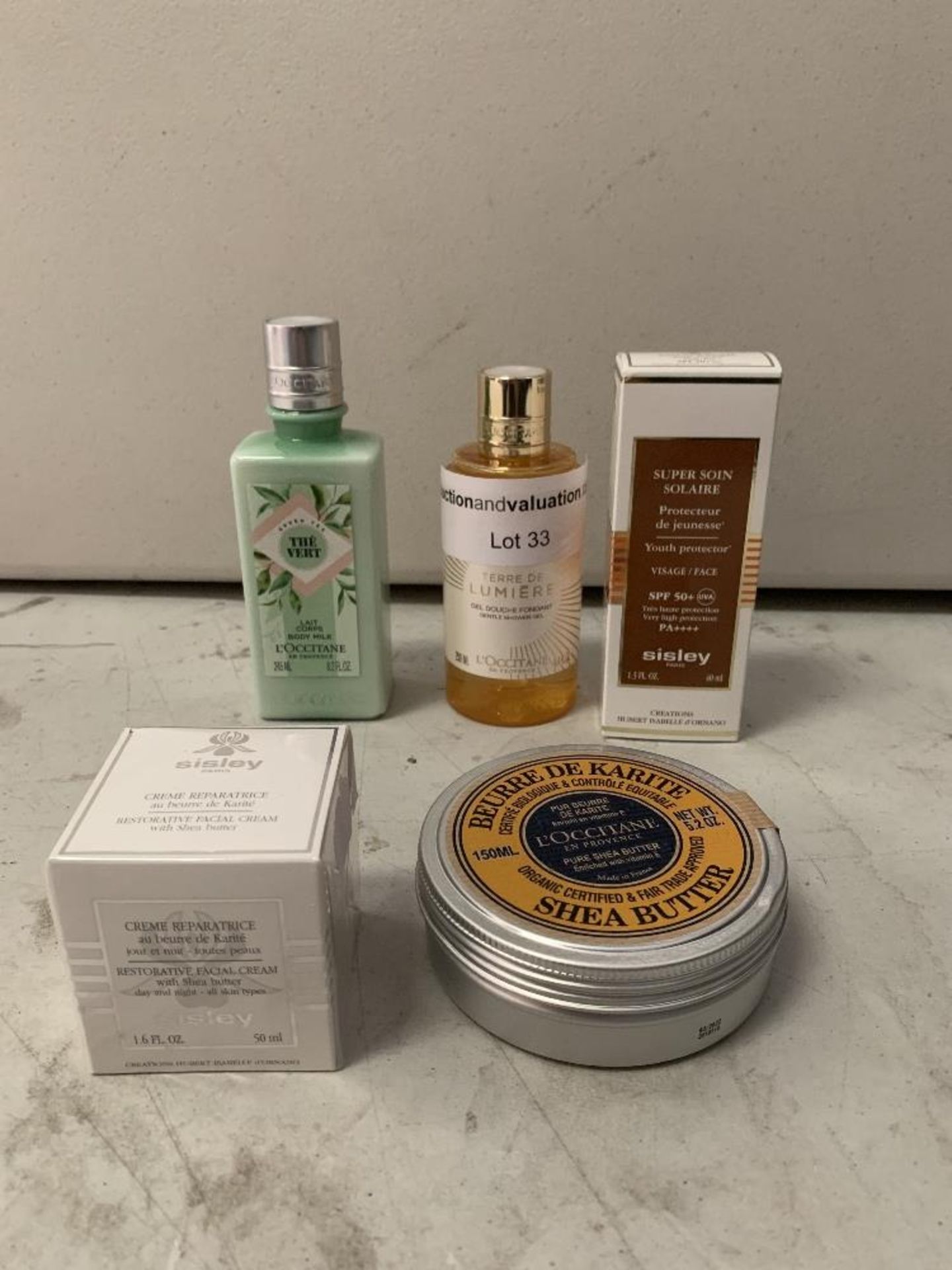 Beauty products unused and sealed to include; L'Occitane shower gel 250ml, L'Occiitane body milk the