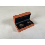A pair of 9ct gold cuff links. 3.5g