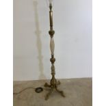 A gilt metal and onyx standard lamp.W:35cm x D:35cm x H:145cm