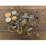 A quantity of rings and jewellery also within some collectible coins