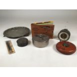 A collection of miscellaneous items to include silver plated tray, vintage measuring tape,