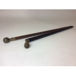 A collapsible pool cue/walking stick with inlaid decoration together with a walking stick with a