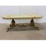 An onyx coffee table on a gilt metal base.W:115cm x D:52cm x H:44cm