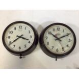 Two Smiths Bakelite cased wall clocks. An 8 day seven jewel example and a Sectric electric example.