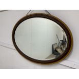 An oval inlaid mirror and another.W:83cm x D:cm x H:58cm
