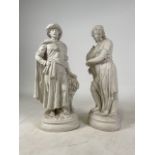 A pair of Parian ware figures of a woman and a man carrying a bundle of wheat. H: 46cm