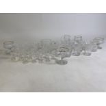 A mix collection of glass pieces to include sherry & port glasses, French gilt champagne glasses,