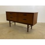 A G-Plan style sideboard with four drawers.W:137cm x D:42cm x H:72cm