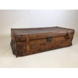 A large leather suitcase stamped Wilson.W:82cm x D:47cm x H:28cm