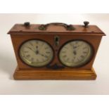 A Jaques & Son satinwood. Congress Chess Timer with twin dials having seconds dials, a going/stop