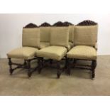 Set of six oak upholstered chairs with carved backs, barley twist legs and castors to front.W:50cm