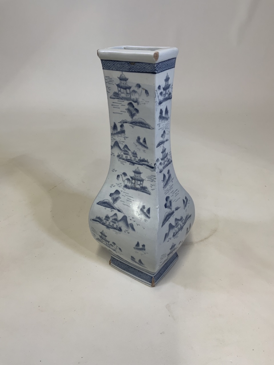 A Chinese four character vase.W:17cm x D:15cm x H:36cm
